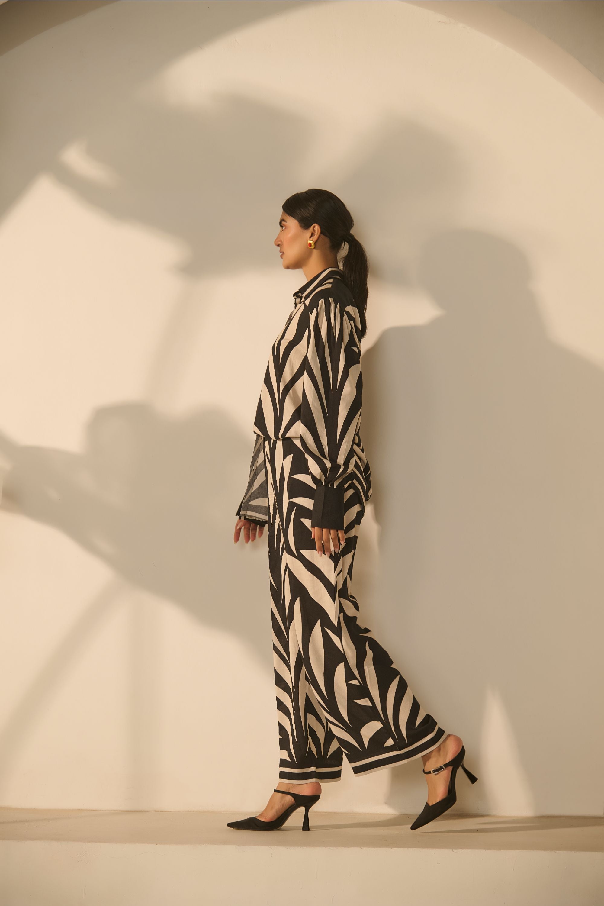 A contemporary black-and-white abstract 
geometric/zebra-style printed Co-ord Set.