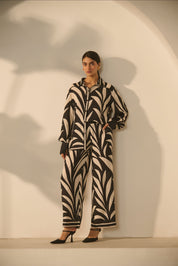 A contemporary black-and-white abstract 
geometric/zebra-style printed Co-ord Set.