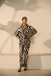 A contemporary black-and-white abstract 
geometric/zebra-style printed Co-ord Set.