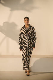 A contemporary black-and-white abstract 
geometric/zebra-style printed Co-ord Set