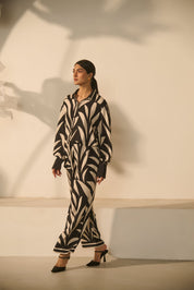 A contemporary black-and-white abstract 
geometric/zebra-style printed Co-ord Set.