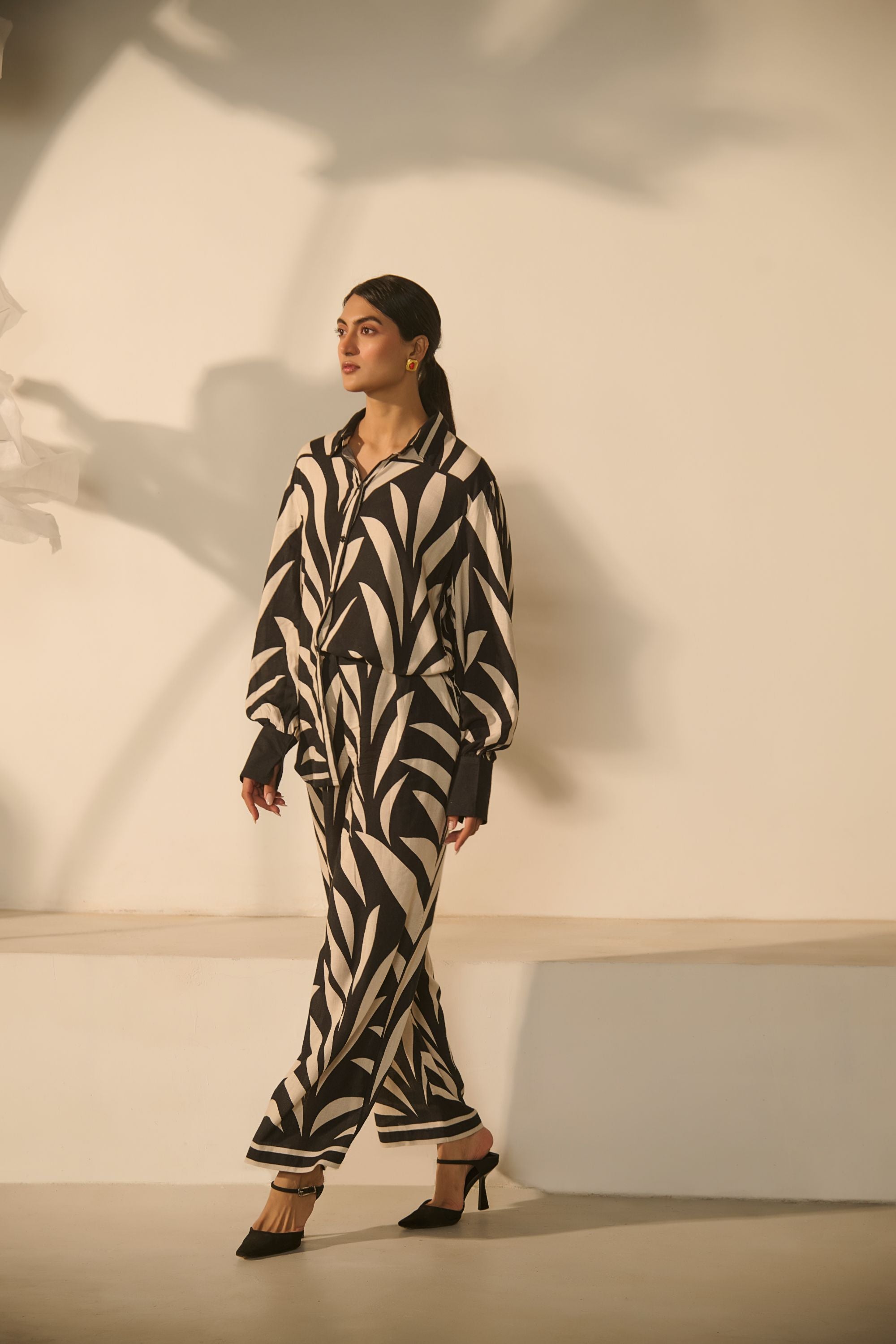 A contemporary black-and-white abstract 
geometric/zebra-style printed Co-ord Set.
