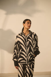 A contemporary black-and-white abstract 
geometric/zebra-style printed Co-ord Set.