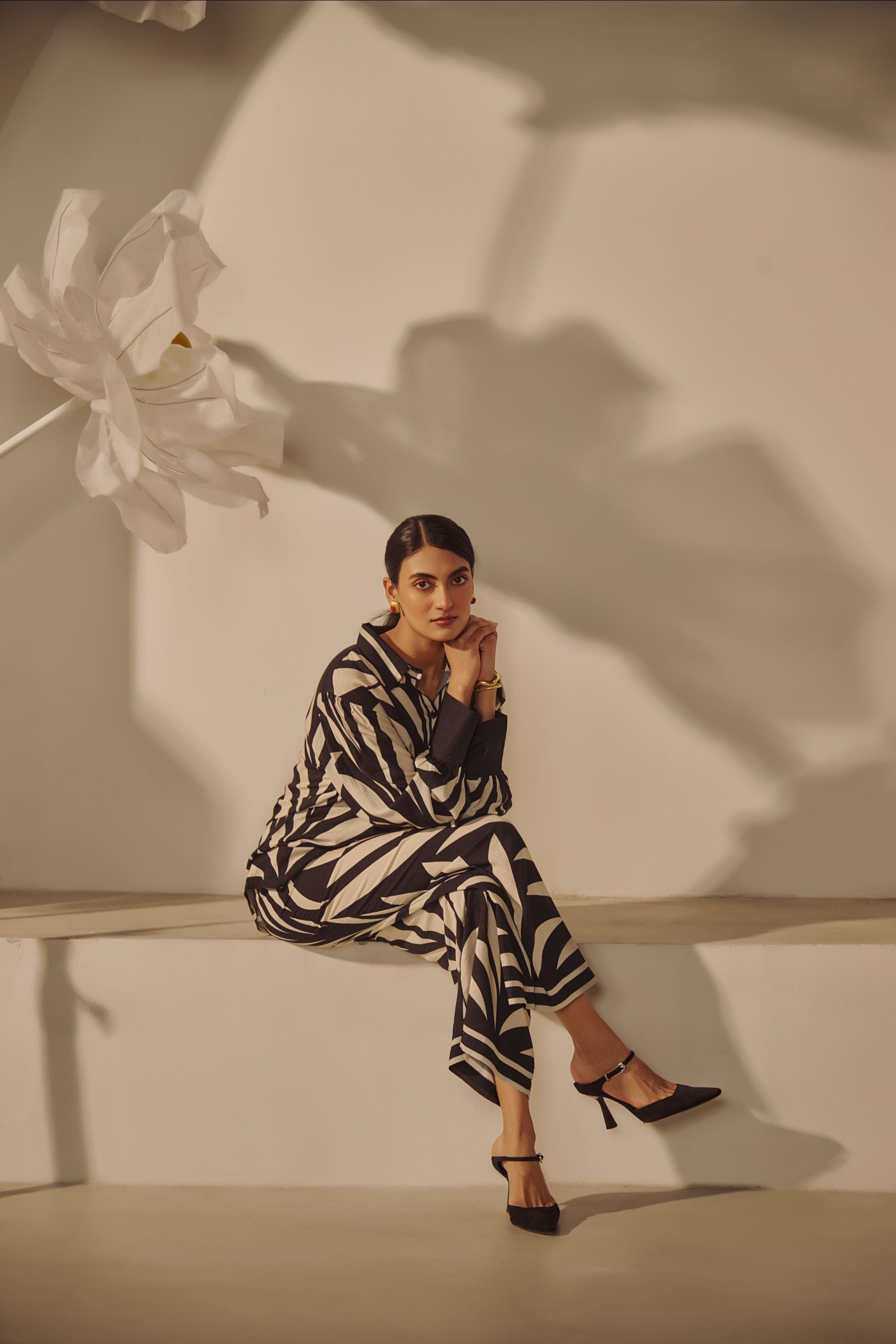 A contemporary black-and-white abstract 
geometric/zebra-style printed Co-ord Set.